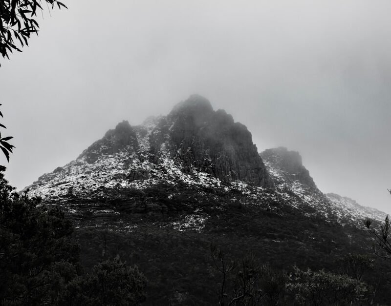 Misty mountain peaks representative of the Rwenzori Mountains trekking terrain, Uganda